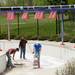 Workers refinish the bottom surface of the lazy river feature. Melanie Maxwell I AnnArbor.com